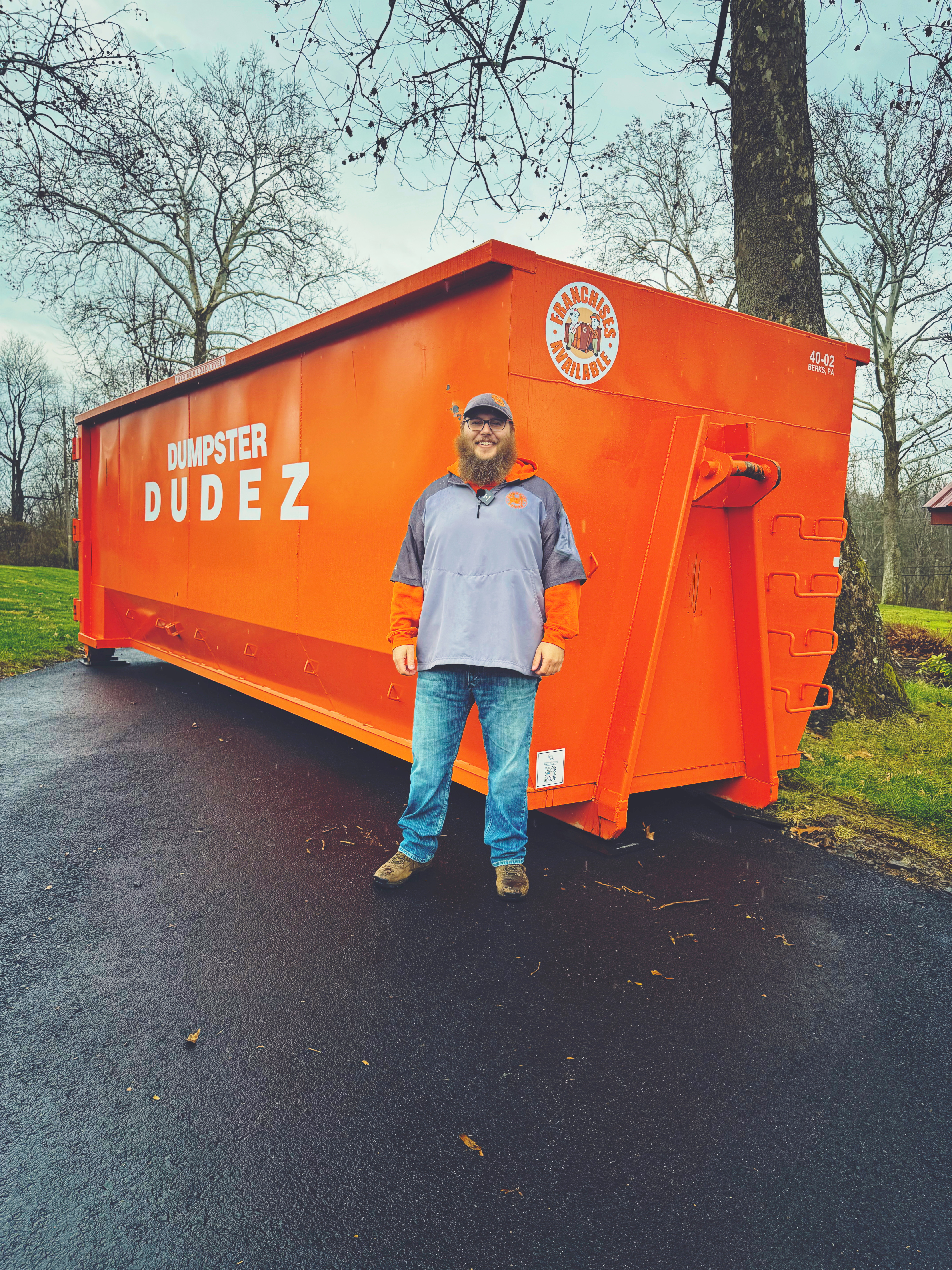 A Dumpster Dudez truck delivering a 40 yard dumpster in Berks County, PA.