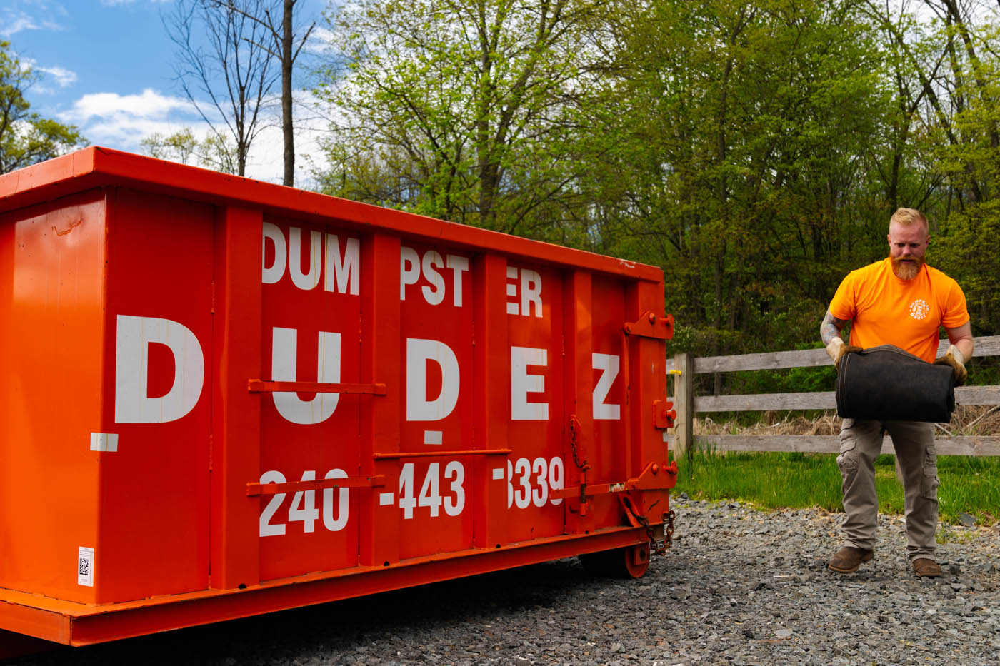 A large dumpster from Dumpster Dudez ready to help with bulk trash pickup in Richmond, VA.