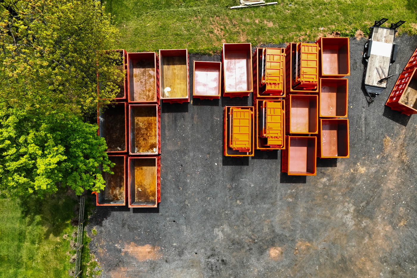 
				Sky view of a holding lot for commercial dumpsters at Dumpster Dudez.		
			