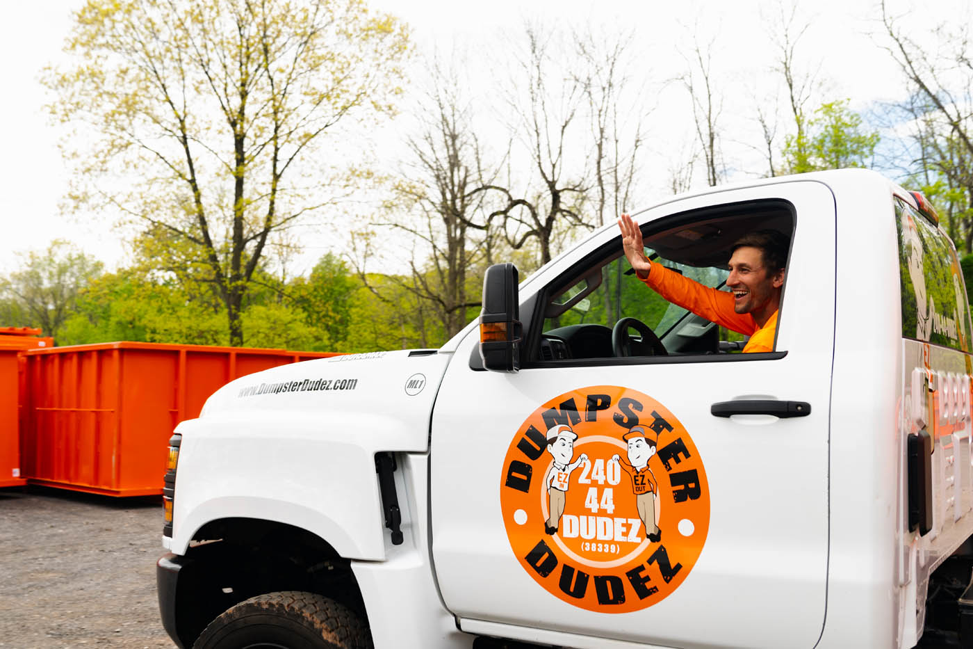 A Dumpster Dudez truck - contact us today to work with a reliable dumpster company!