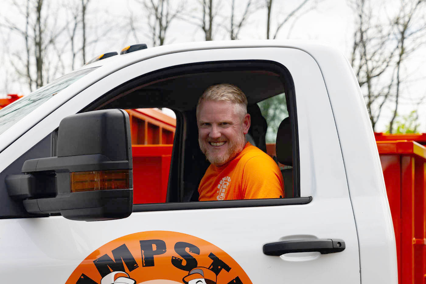 
				One of Dumpster Dudez's corporate team members backing up a South Bend / Elkhart roll off dumpsters.
			