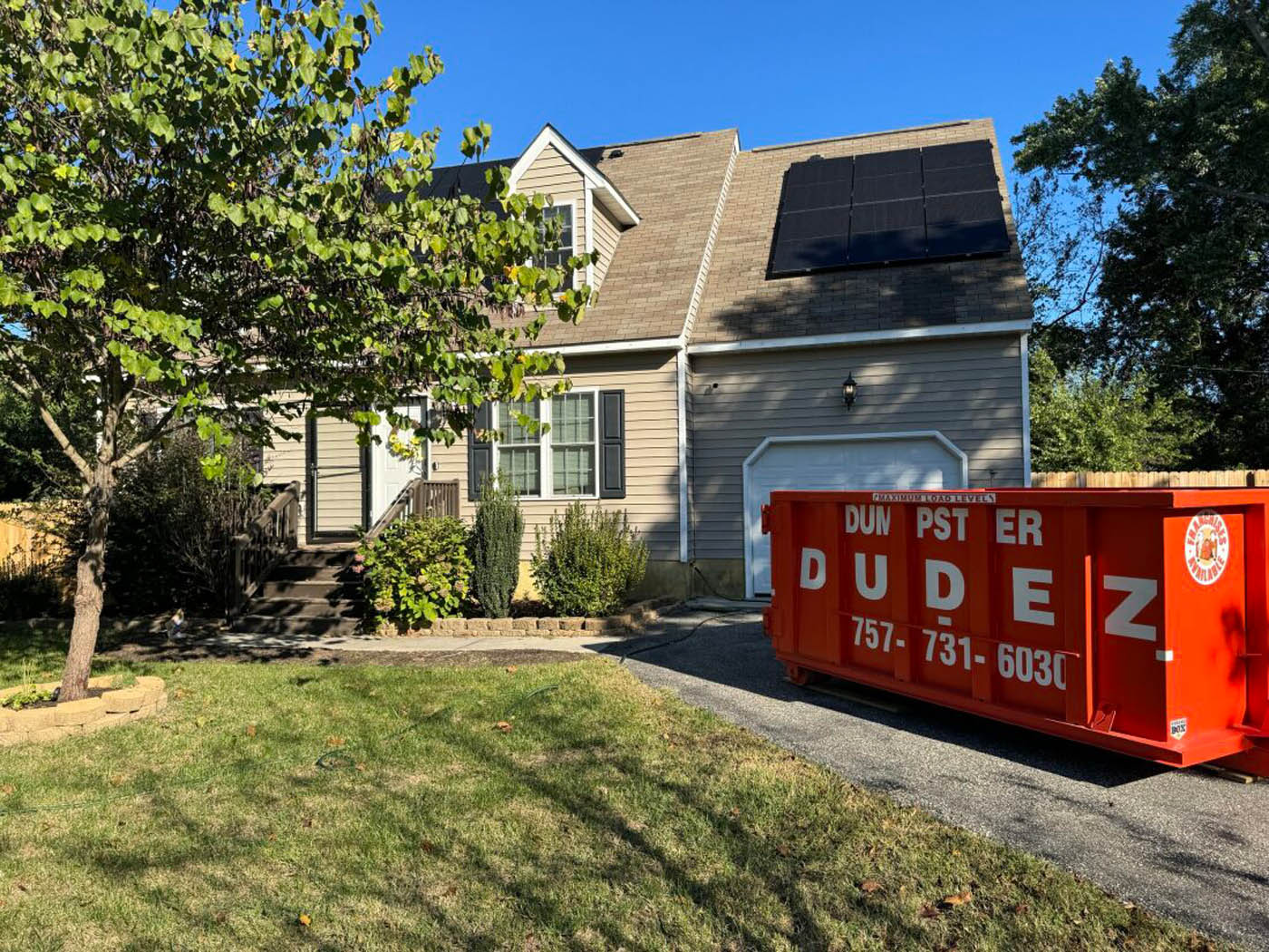 
				A 10 yard dumpster in front of a residential home in Boise / Nampa, ID.
			