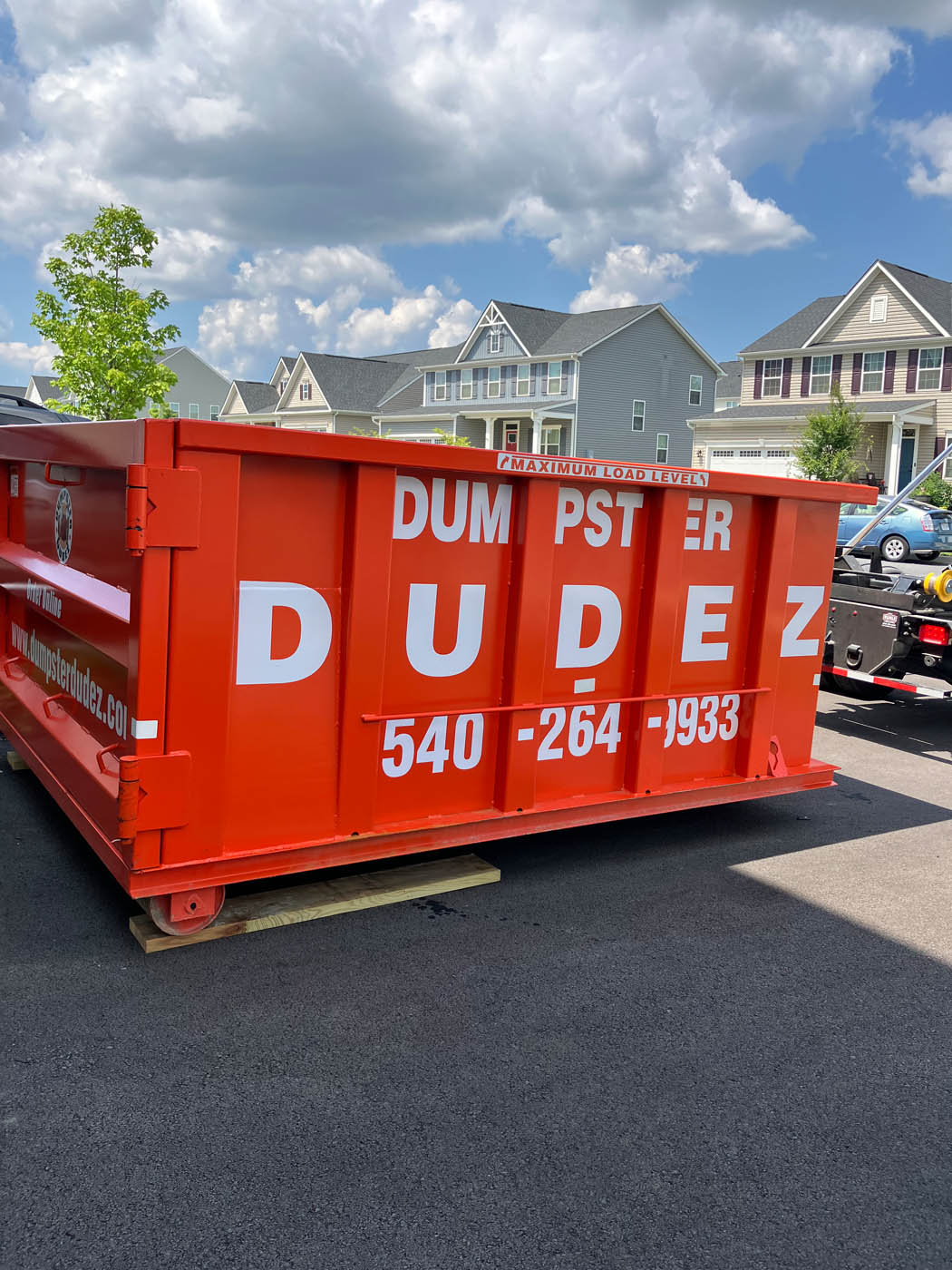 
				Two Dumpster Dudez of Fort Worth small dumpsters in driveways, ready to help remove waste from smaller projects.
			