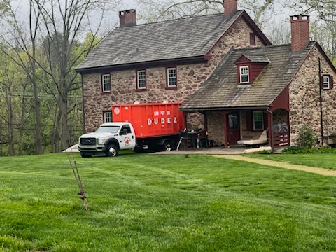A Dumpster Dudez truck ready for junk removal in Omaha, NE.