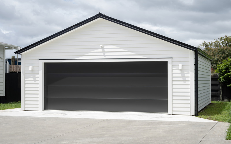 The exterior of a garage - if you are in need of Richmond garage clean out services, contact Dumpster Dudez today.